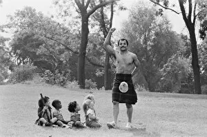 Images Dated 4th September 1978: John Conteh gets the Scottish flavour on Parliament Hill Fields today watched by curious