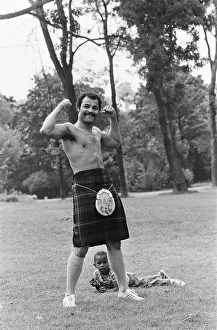 Kilt Prints: John Conteh gets the Scottish flavour on Parliament Hill Fields today watched by curious