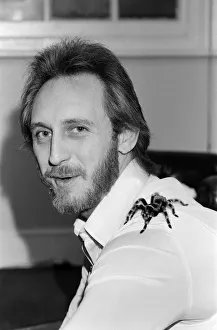 00450 Prints: John Entwistle, bass guitarist of British rock group The Who with his pet tarantula Doris