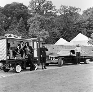 00453 Prints: John Entwistle and Keith Moon of the rock group The Who show off their new cars