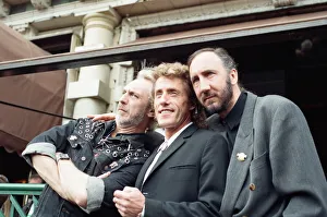 John Entwistle, Pete Townshend and singer Roger Daltrey of The Who rock group pat