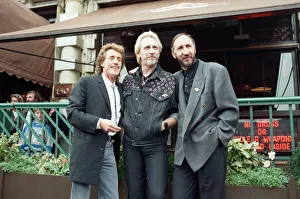 John Entwistle, Pete Townshend and singer Roger Daltrey of The Who rock group pat