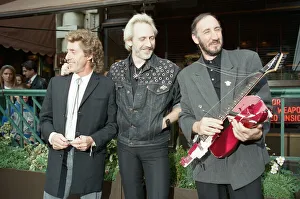 John Entwistle, Pete Townshend and singer Roger Daltrey of The Who rock group pat