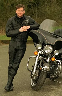 John Gordon Sinclair actor beside his Harley Davidson Electra Glide motorcycle