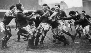 Five Nations Prints: John Gwilliam, the Welsh captain, is well and truly held by the Irish forwards