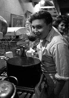 John Harper pupil cook seen here training in TV cook Fanny Cradock kitchen October