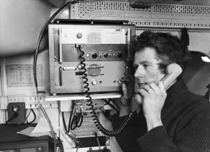 Equipment Prints: John Hart receives a message on the ship to shore lifeboat radio in Barry, Wales