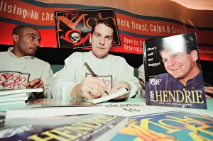 00602 Prints: John Hendrie, Middlesbrough Football Player 1990-1996, pictured signing copies of his