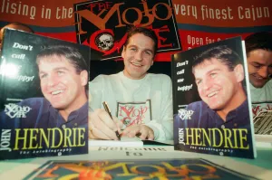 00602 Prints: John Hendrie, Middlesbrough Football Player 1990-1996, pictured signing copies of his