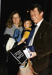 John Hurt Actor with wife Jo Dalton and son leaving the Ivy restaurant after the launch