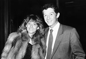 Ties Prints: John Hurt British film actor and wife at airport in February 1985