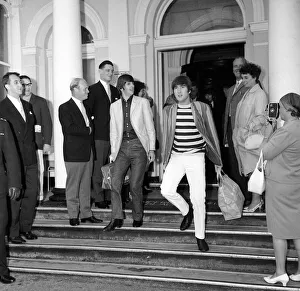 John Lennon and and Ringo Starr of The Beatles leaving the Imperial Hotel in Blackpool