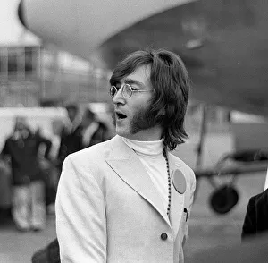 Sideburns Prints: John lennon at Heathrow aiport for the The Beatles visit to India to meet Maharishi