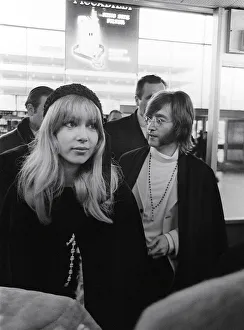 John Lennon at Heathrow Airport off to India Feb 1968 With the rest of The Beatles