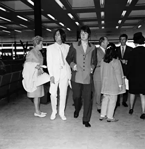 John Lennon and Paul McCartney of The Beatles at London Airport, 11 May 1968