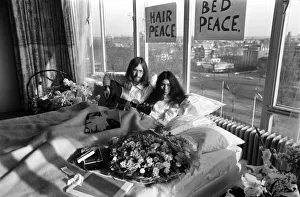 Hippies Prints: John Lennon and his wife Yoko Ono are having a weeks love-in their room at the Hilton
