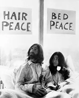 John Lennon and his wife Yoko Ono are having a weeks love-in their room at the Hilton