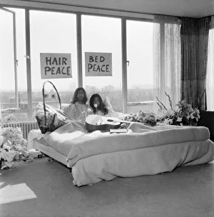 John Lennon and his wife Yoko Ono are having a weeks love-in their room at the Hilton