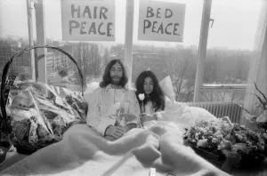 John Lennon and his wife Yoko Ono are having a weeks love-in their room at the Hilton