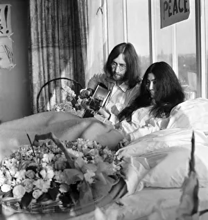 John Lennon and his wife Yoko Ono are having a weeks love-in their room at the Hilton