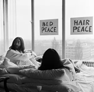 John Lennon and his wife Yoko Ono stage a bed in in a hotel in Amsterdam