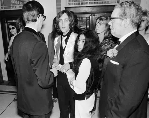 John Lennon and Yoko Ono on their first public appearance together at London