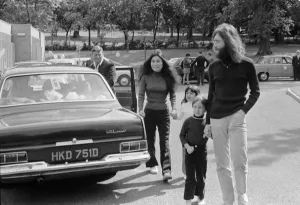 John Lennon and Yoko Ono greeting fans near their home in Surrey before a trip up to