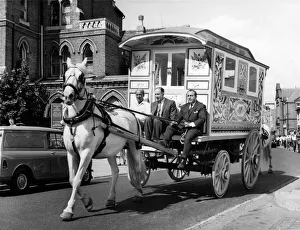 00053 Prints: John Lennons gaily-painted gipsy caravan or its way to its new home