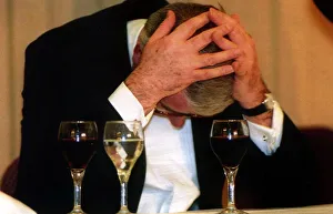 Worried Prints: John Major attending the Leeds Chamber of Commerce and Industry dinner. Head in hands