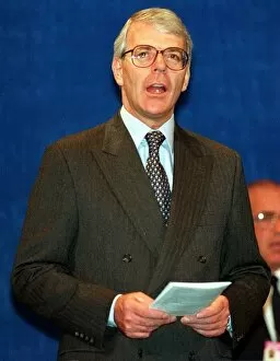 Images Dated 10th October 1995: John Major MP Prime Minister singing at the Conservative party Conference in Blackpool