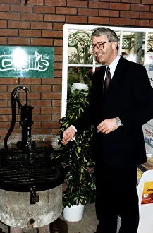 Coins Prints: John Major Prime Minister throwing money into a wishing well during the 1992 election