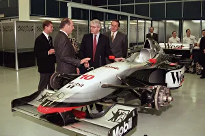 Motor Sports Prints: John Major visiting the headquarters of McLaren motor racing team during the general