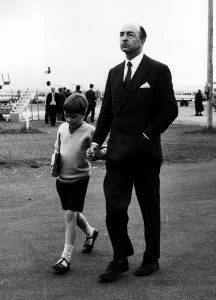 John Profumo with his son David - August 1963 arriving in Scotland