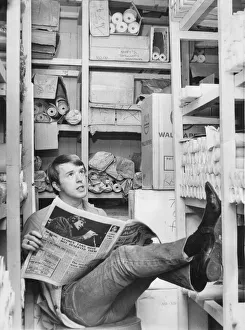 Warehouses Prints: John Steel, former drummer of The Animals, working as the manager of a small wallpaper