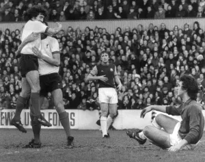 John Toshack hugs Liverpool teammate Kevin Keegan after he scores the first goal against