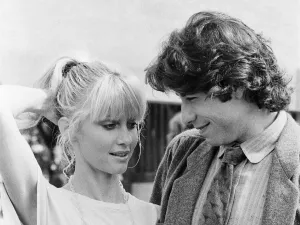 01059 Prints: John Travolta and his co star Olivia Newton John in England during the week of release of
