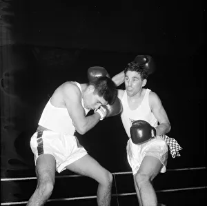 Johnny Cesspooch USA v Peter Benneyworth England seen here at a Amateur Boxing contest