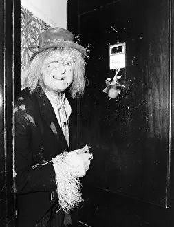 Costumes Prints: Jon Pertwee actor in costume as Worzel Gummidge at his dressing room door Cambridge
