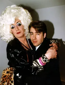 Jonathan Ross TV presenter with arms around drag queen Lily savage
