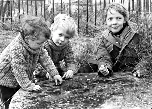 Jonathon and David Kershaw with Mark Bretherton collect their dole money from