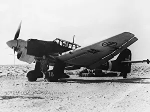 01433 Prints: One of the ten JU 87s German dive bombers manned by Italians forced landed recently
