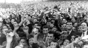 Spectators Prints: Jubilant crowds celebrate Cardiff Citys 1-0 defeat of Aston Villa in front of a 55