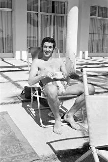 Jubilant Derby County John Robson celebrates with a cup of team on holiday in Majorca