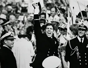 Jubilant Prince Andrew ashore with proud father Prince Philip after the carrier HMS