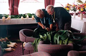 Leeks Prints: Judges Eddy Moffatt and Joe Blakey looking and measuring the gigantic prize winning leeks