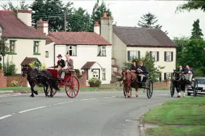 Flowers And Plants Prints: Judges in horse-drawn carriages view the village of Hartlebury, Worcestershire