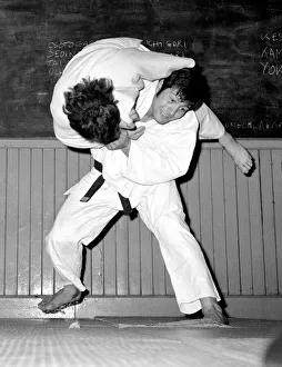 Judo Champion Angelo Parisi working out at his club in Fulham Judo kit