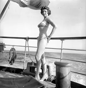 Julie Alexander models the latest swimwear whilst on a sail ship in the channel