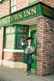Bouquet Prints: Julie Goodyear is pictured outside The Rovers Return on the set of Coronation Street