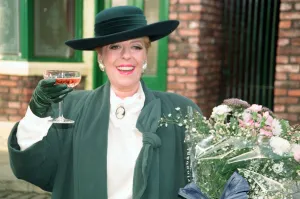 Julie Goodyear is pictured outside The Rovers Return on the set of Coronation Street